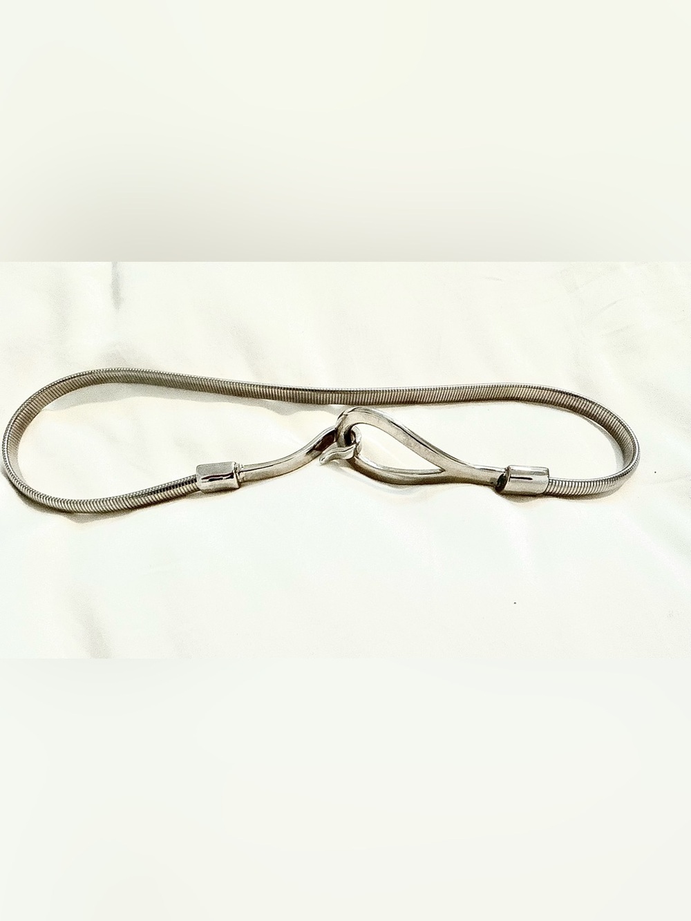 Vintage skinny silver heavy duty stretch snake waist belt.